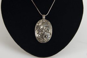 Oval Pendant with Garnet Stone